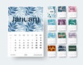 Calendar template for 2022 with tropical twigs, leaves, botanical theme, indicated weeks of the year, on a white background Royalty Free Stock Photo