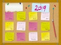 2019 calendar. Week starts on Sunday. Cork board with notes. Royalty Free Stock Photo