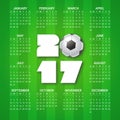 Calendar for 2017 Year with soccer ball on bright green background. Sport, football theme. Week starts from sunday.