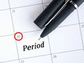 Calender with date highlight for period. Close-up Of Marking Menses Date On Calendar Royalty Free Stock Photo