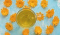 Calendula tisane in glass mug