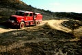 Calfire fire truck patrolling burned area