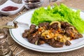 Calfs liver with letucce garnish Royalty Free Stock Photo