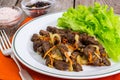 Calfs liver with letucce garnish Royalty Free Stock Photo