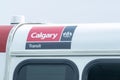 A close up to a Calgary transit logo on a bus