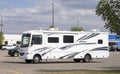 A Coachmen Mirada Bunk Bed RV Camper trailer in a parking lot