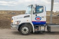 The front profile view of an AMA or CAA Alberta Motor Association truck on the road Royalty Free Stock Photo