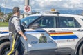 An RCMP officer about to get to his vehicle