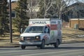 An U-Haul small van truck. A moving truck, trailer, and self-storage rental company