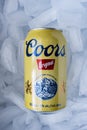 A Coors Original beer can 355 ml on a bed of ice