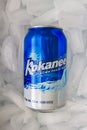 A Kokanee beer can 355 ml on bed of ice