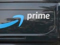 A Close up to an Amazon Prime logo on a delivery truck