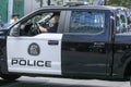 A close up to a Calgary police vehicle pickup truck during summer