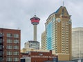 A wide-angle, low-angle view of Calgary\'s iconic skyline, featuring the Calgary Tower and Royalty Free Stock Photo