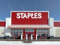 The entrance structure of a Staples store amid winter, set against a backdrop of a clear Royalty Free Stock Photo