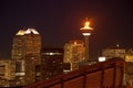 CALGARY, ALBERTA, CANADA -JANUARY 18, 2010: The iconic Calgary Tower in Downtown Calgary, Alberta with it`s flame lit Royalty Free Stock Photo