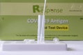 A Rapid Response rapid rest kit in the process of testing for Covid 19 at home.