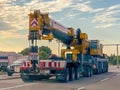 A back side of a All Terrain Crane on the route