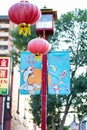 Lamp post with Chinese traditional lanterns in downtown Chinatown. Royalty Free Stock Photo