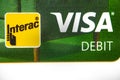 A Macro close up to the visa logo on a debit card