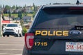 A close up to the back of a Calgary Police Service vehicle