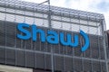 A close up to a Shaw building sign during spring