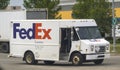 A Fedex delivery service truck van on the route during spring Royalty Free Stock Photo