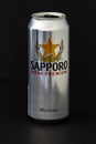 An isolated Stella Sapporo Tallboy Beer Can on a black background