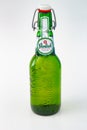 Grolsch premium lager bottle with a flip-top closure on a white background