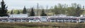 Front view panoramic of several U-Haul trucks parked in a storage facility Royalty Free Stock Photo