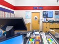 Inside a Canada Post office, the service counter is ready to assist customers with their Royalty Free Stock Photo