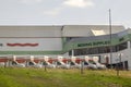 Several U-Haul trucks parked on a Moving supplies company building Royalty Free Stock Photo