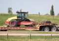 A Single drum roller for soil compaction being transported