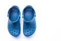 Blue Crocs footwear, foam clog shoes on a white background