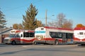 A Double bus from Calgary Transit on a stop bus on a main street Downtown