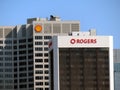 A Rogers and Shell sign buildings in Calgary downtown