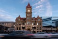 Cars cruising past Calgary`s historic city hall Royalty Free Stock Photo