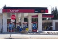 View of COOP Gas Station with extremely low price for gas. Cheap Gas Prices and Fuel Savings Royalty Free Stock Photo