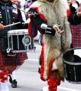 Kilted drummer in marching band in the Calgary Stampede Parade Royalty Free Stock Photo
