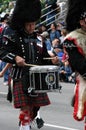 Kilted drummer in marching band in the Calgary Stampede Parade Royalty Free Stock Photo