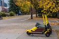 Calgary City electric scooters (e-scooter). Princes Island Park in Autumn season