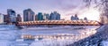 Calgary`s skyline along the Bow River Royalty Free Stock Photo