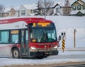 A Calgary transit bus going to the Foothills Medical Center during the winter.