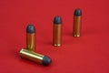 The .45 caliber revolver cartridges on red