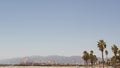 California beach aesthetic, classic ferris wheel, amusement park on pier in Santa Monica pacific ocean resort. Summertime iconic