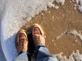 California beach shot of my boots with the sea foam lapping at my feet. For travel blogs as a banner image, graphic, social media