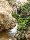 California Coastal Rocks and Cliffs, small cascading waterfall along the coast - Road Trip down Highway 1 Royalty Free Stock Photo