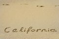 California handwritten in sand Royalty Free Stock Photo