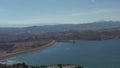 California Landscape: beautiful footage of the dam of Castaic lake near Los Angeles on a beautiful sunny day, 4k aerial