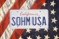 California License Plate Ã¯Â¿Â½Sohm USAÃ¯Â¿Â½ Lying on American Flag, United States